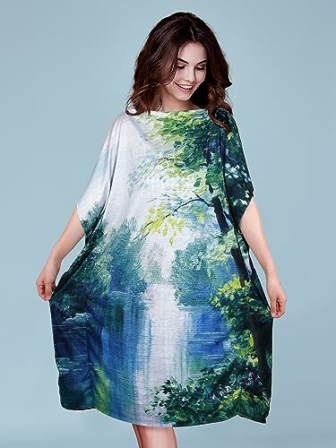 Woman wearing a dress with a forest scene design